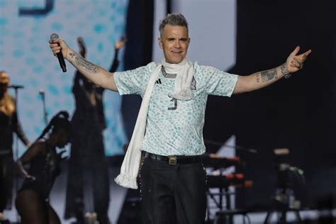  La Gira Rebelión de Robbie Williams: Un Viaje Musical Entre la Nostalgia y la Innovación